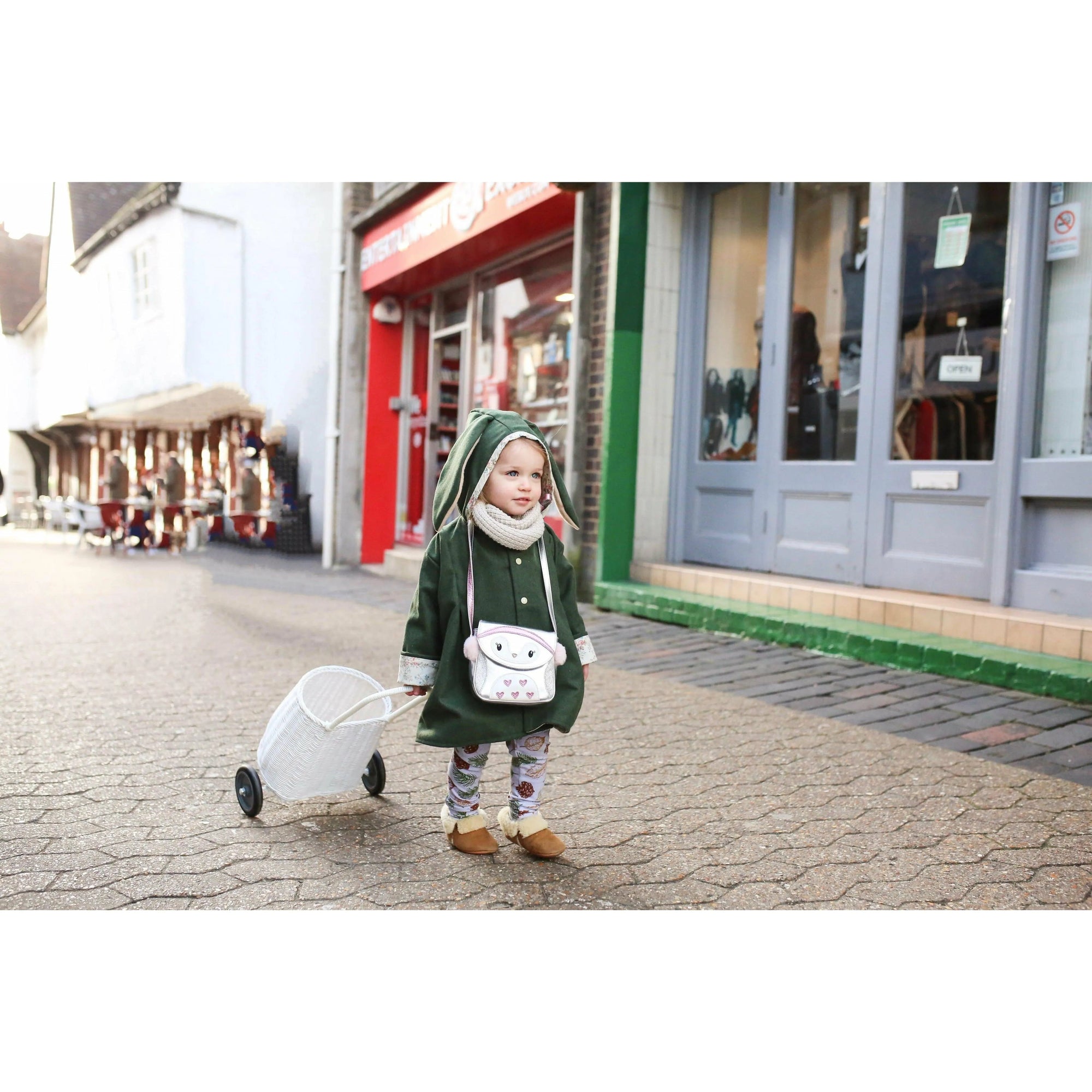 handmade girls green coat with bunny ears and pom tail by Lottie & Lysh