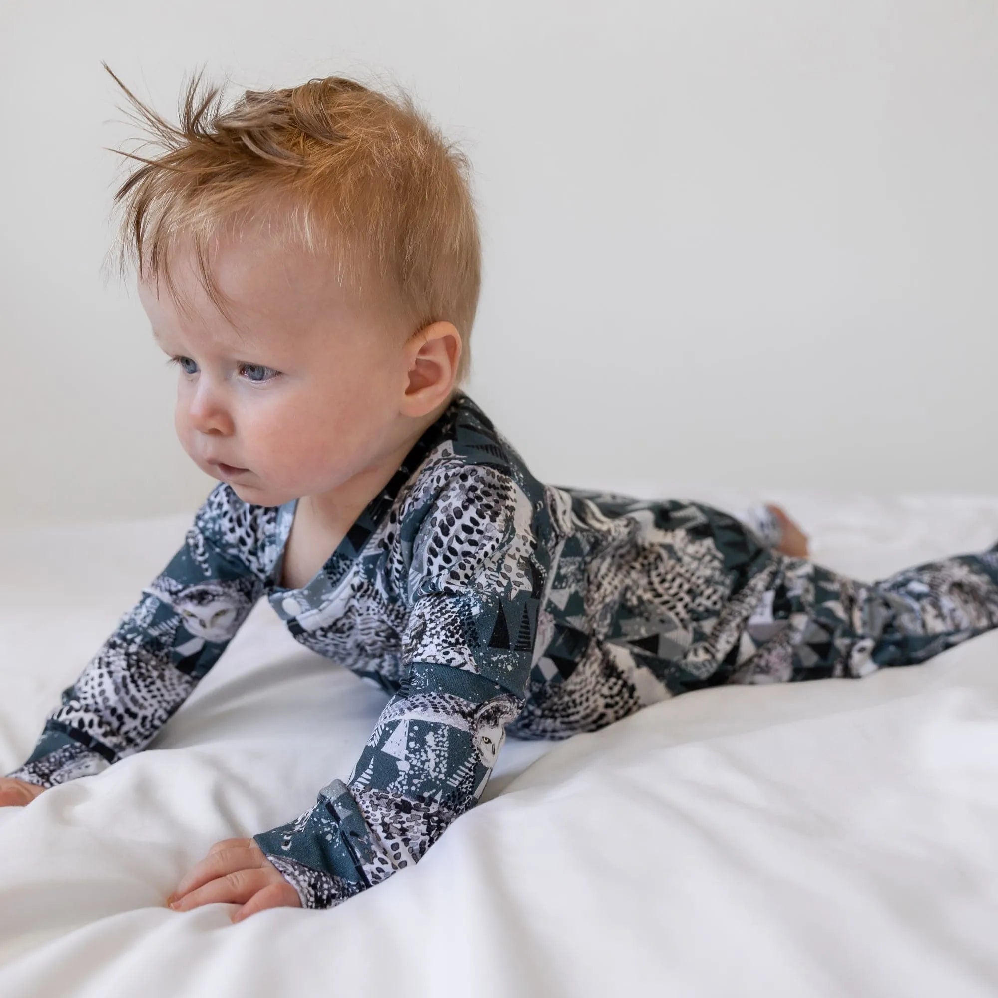 winter owls baby romper modelled by a baby boy