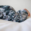 close up product photo of the artic owls romper by lottie and lysh