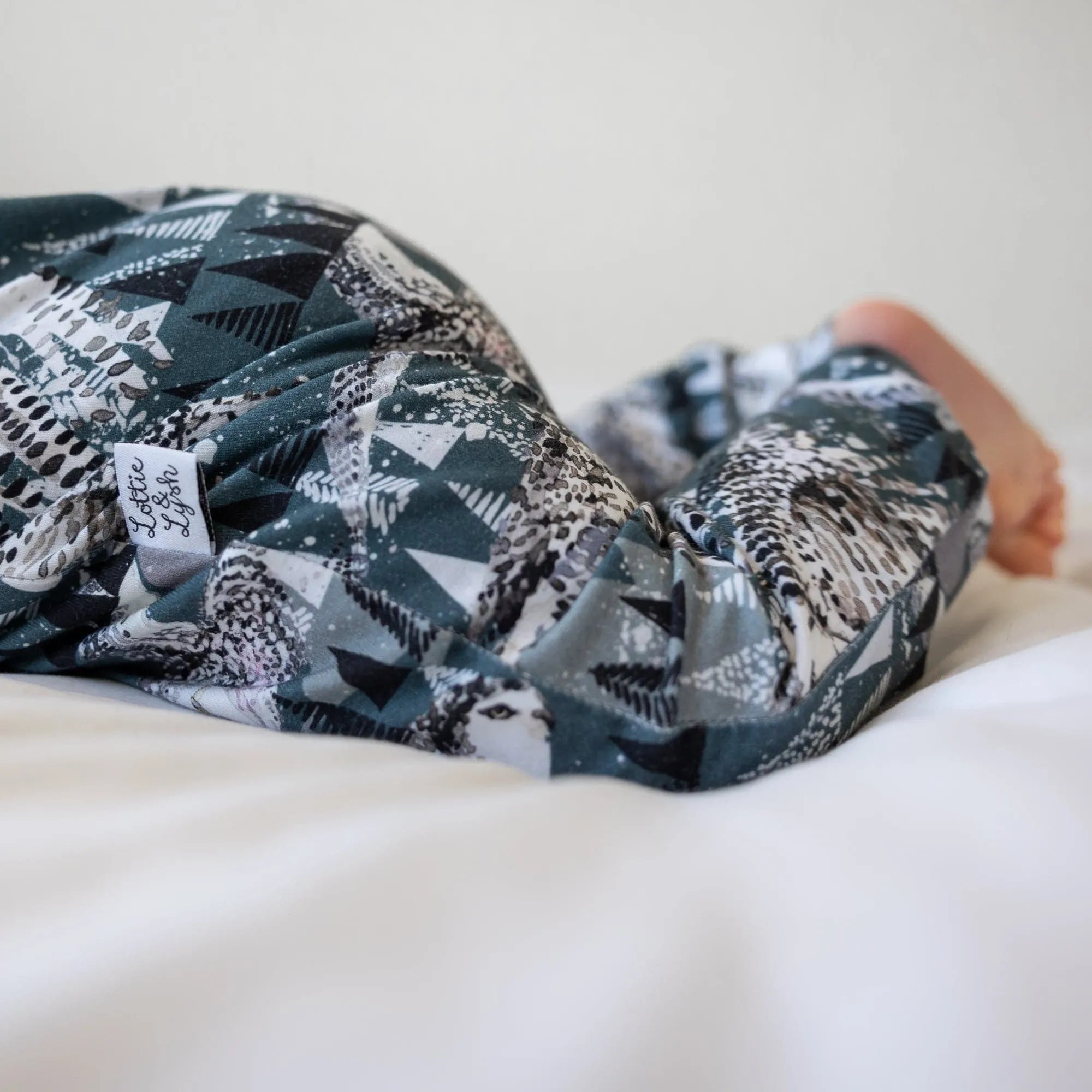 close up product photo of the artic owls romper by lottie and lysh