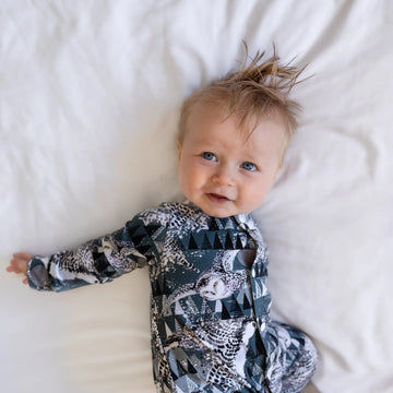 cute baby boy wearing a lottie and lysh owl print baby romper