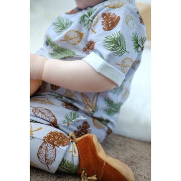 Organic baby romper in festive leaves by lottie & lysh