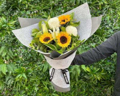 sunflowers, chrysanthemums, and lilies bouquet for delivery