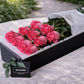 dozen long stemmed pink roses in gift box