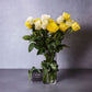 white and yellow long stemmed roses