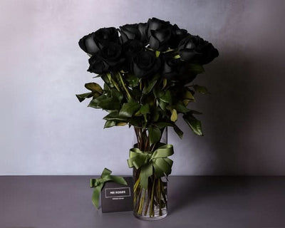 black roses vase