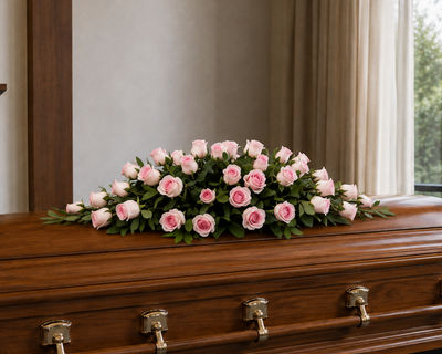 gorgeous mr roses pink roses funeral flowers casket spray