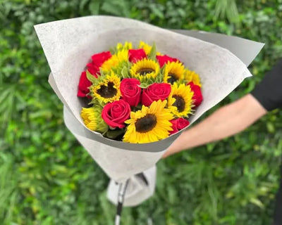 sunflowers and red roses