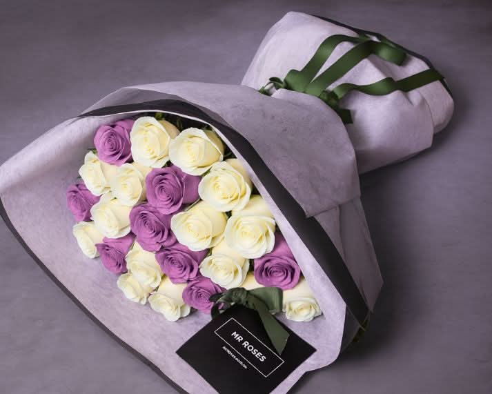 purple and white rose bouquet
