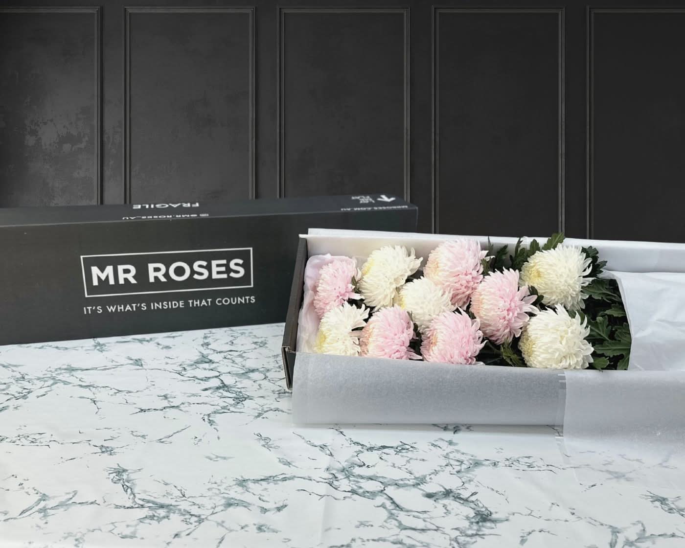 pink and white chrysanthemum flower arrangement