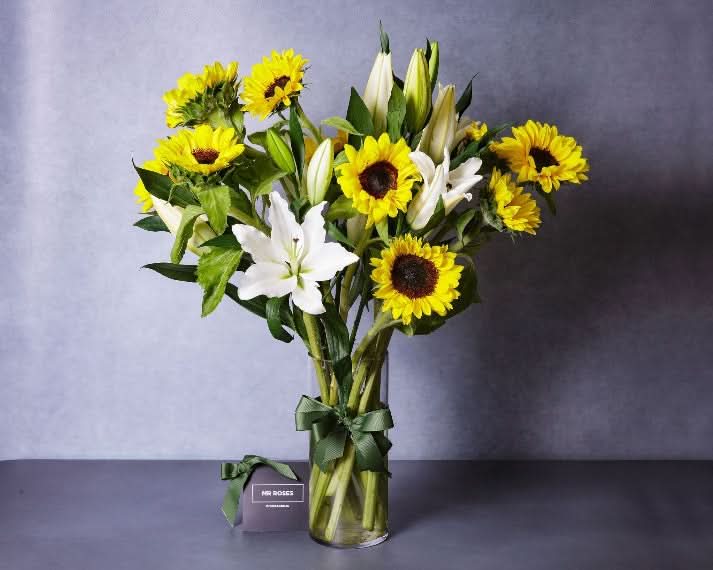 sunflowers and fragrant white lilies flower arrangement for delivery
