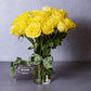 medium stemmed yellow roses in a vase