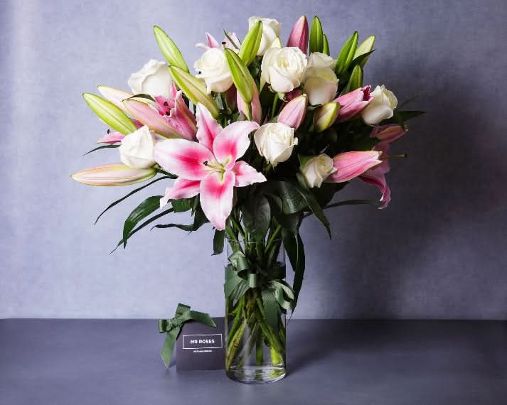 fragrant pink lilies and white roses flower arrangement 