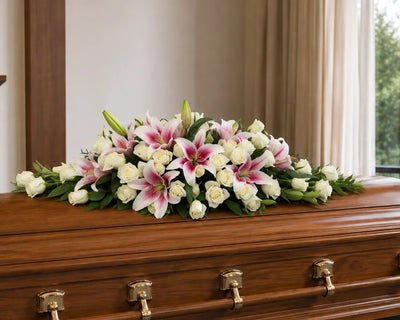 stunning white and pink casket spray funeral flowers