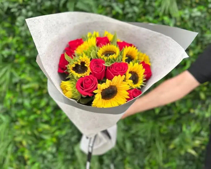 sunflowers and red roses