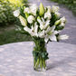 white lilies and white roses flower arrangement