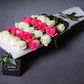 white and pink long stemmed roses