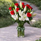 Fragrant white lilies and red roses flower arrangement