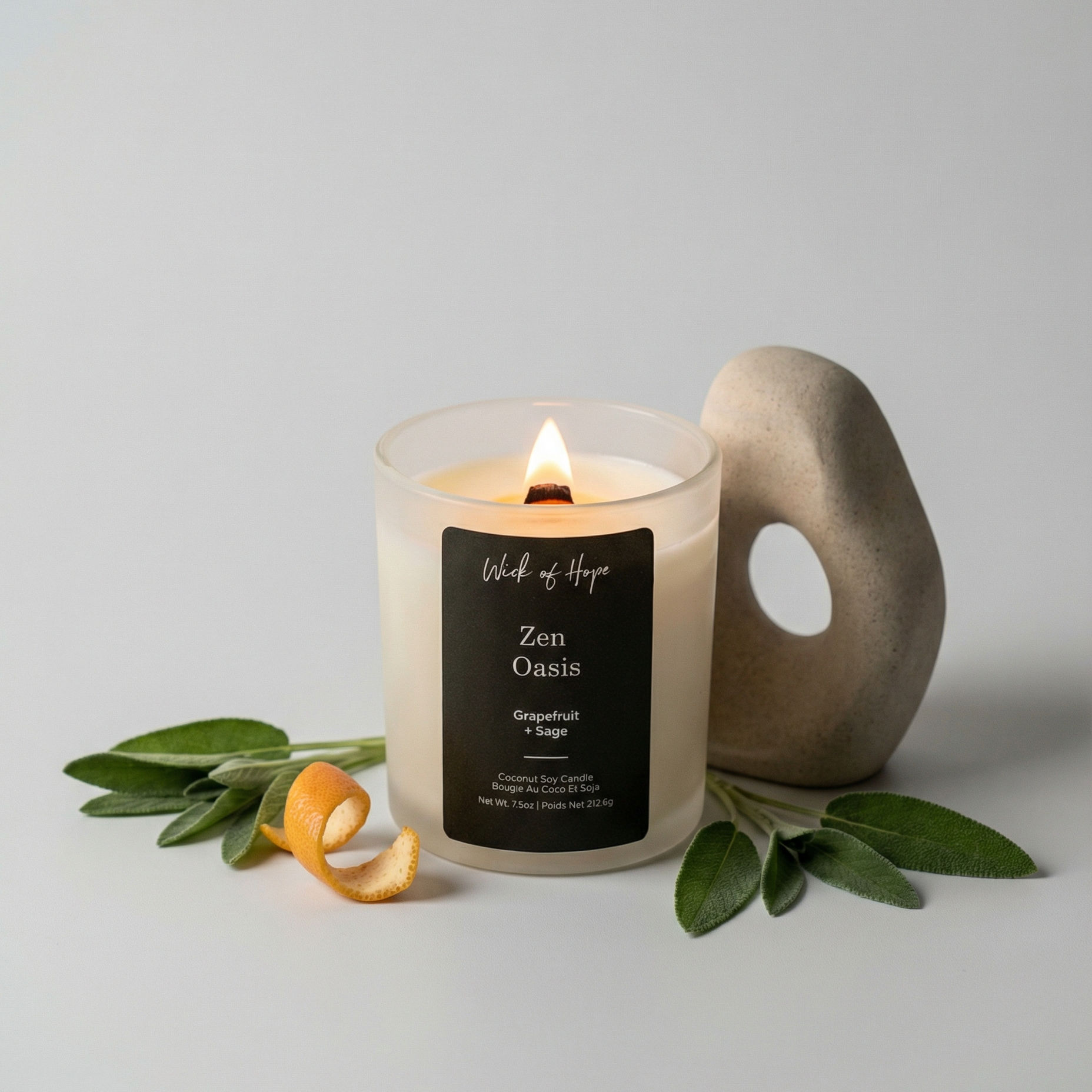 Candle with a decorative handle and 'Zen Oasis' label on a light gray background