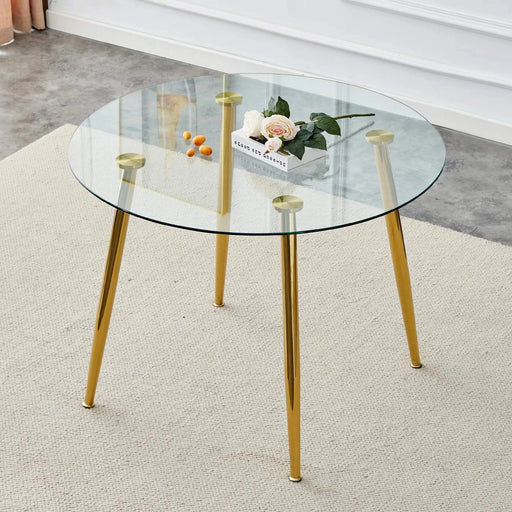 A glass tabletop with a diameter of 40 inches and a modern minimalist circular dining table with gold plated metal legs. 40 '* 40' * 30 ' DT-1164 Default -DTYStore