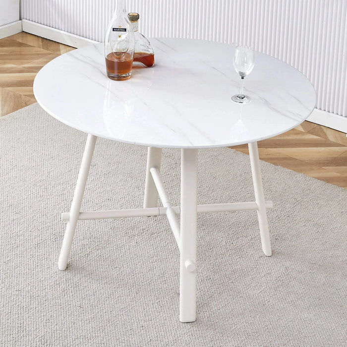 A modern minimalist circular dining table with a 42 inch diameter white patterned tabletop and white metal legs. Suitable for restaurants, living rooms, and conference rooms. Default -DTYStore