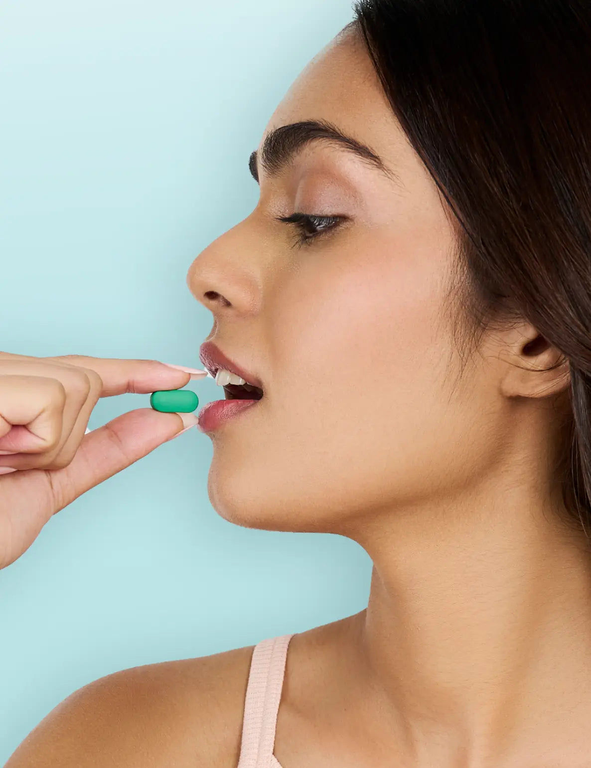 a women consuming glutone hydra tablets