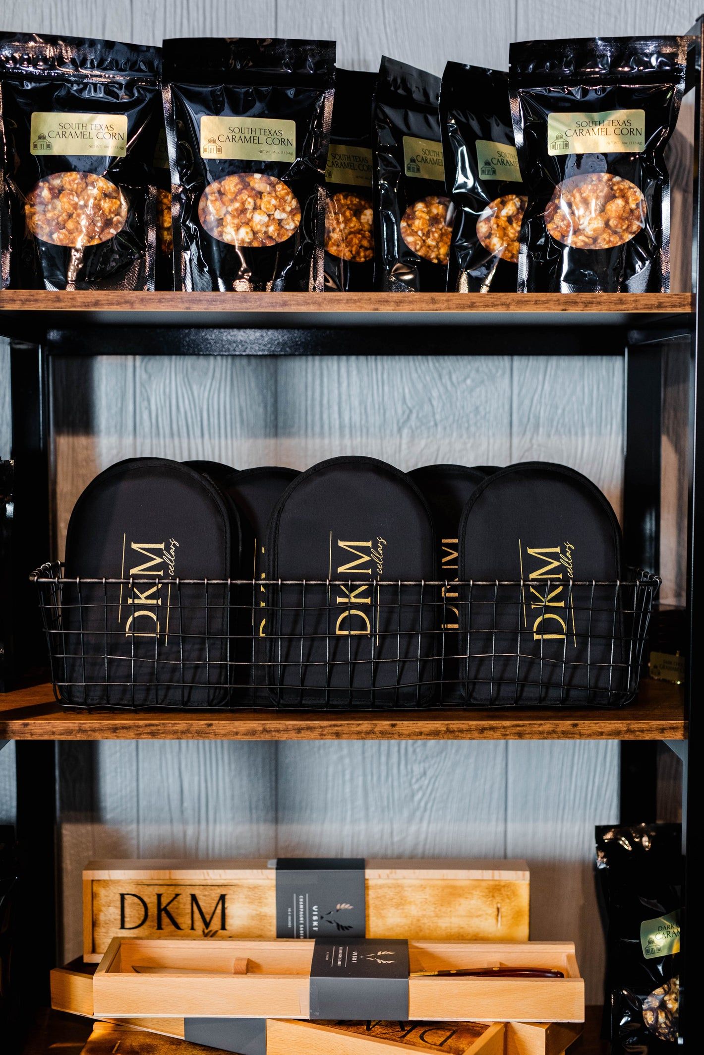 A shelf with a variety of snacks on it.