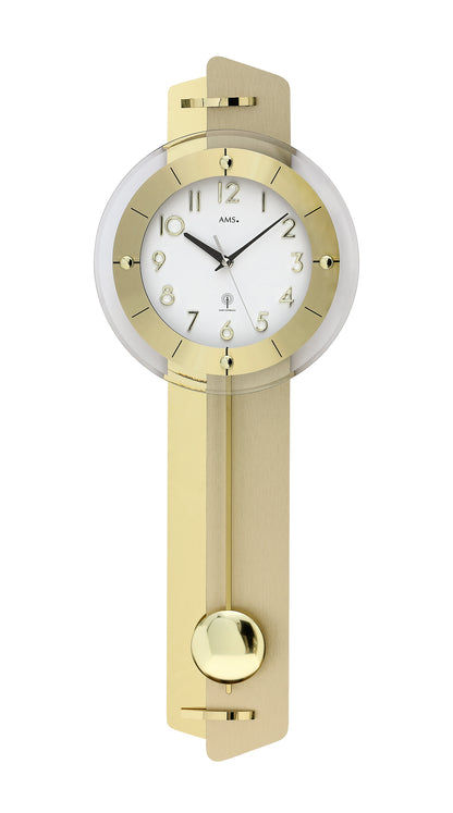 Horloge murale dorée avec mouvement à pendule et cadran rond