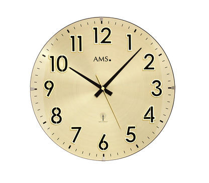 Horloge murale dorée AMS avec chiffres romains et aiguilles