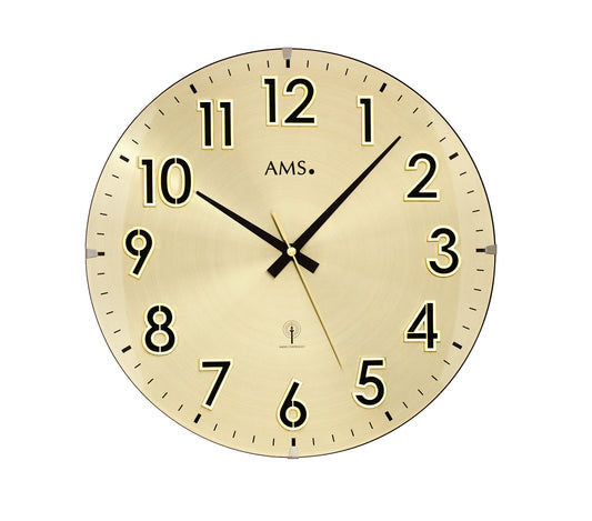Horloge murale dorée AMS avec chiffres romains et aiguilles