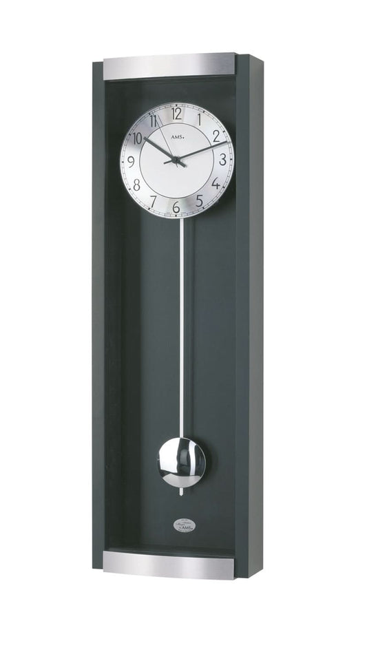 Horloge murale noire à balancier avec façade en verre et balancier métallique visible