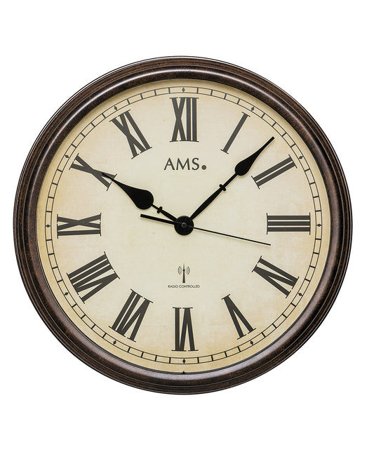 Horloge murale ronde AMS avec cadre argenté, chiffres romains et aiguilles noires