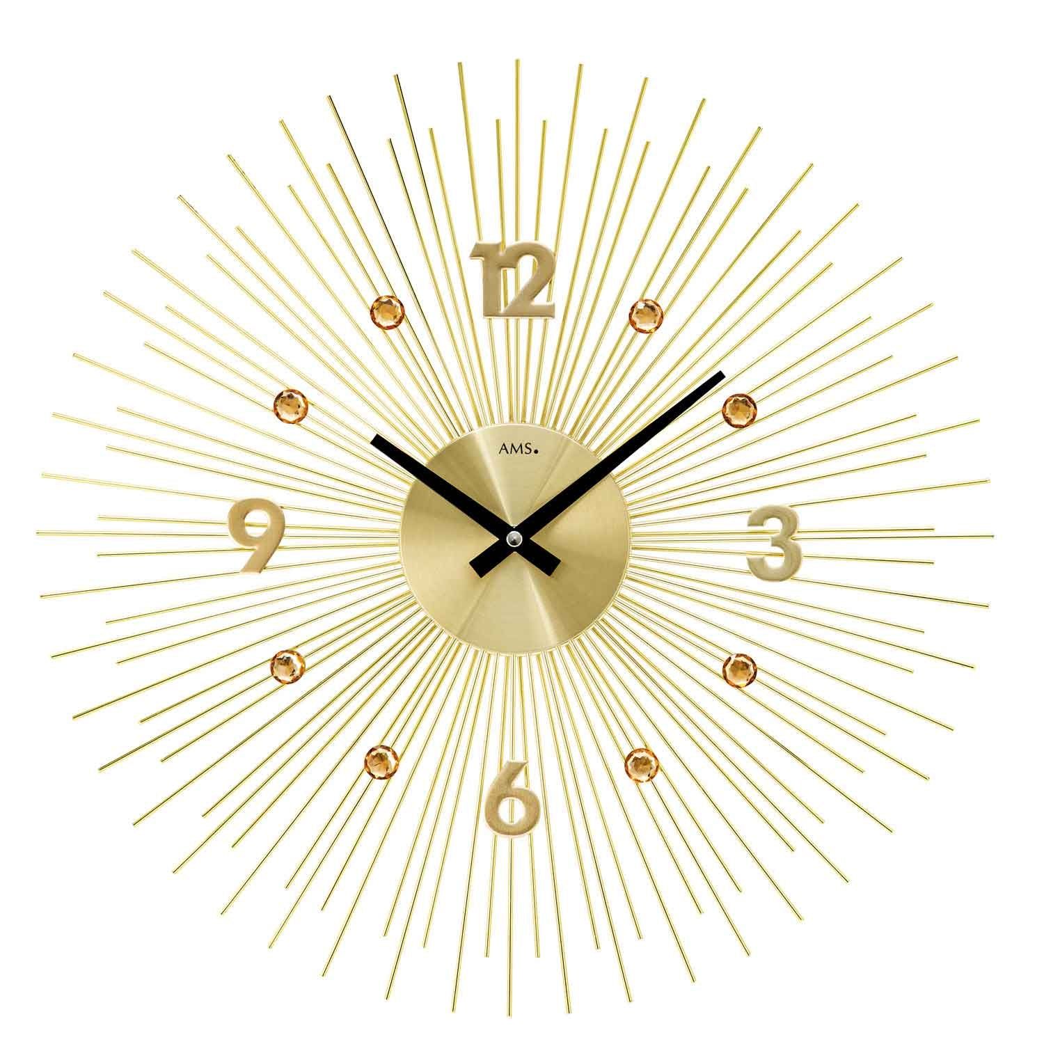 Horloge murale dorée avec boîtier en métal, cadran rond et design à rayons, mouvement à quartz