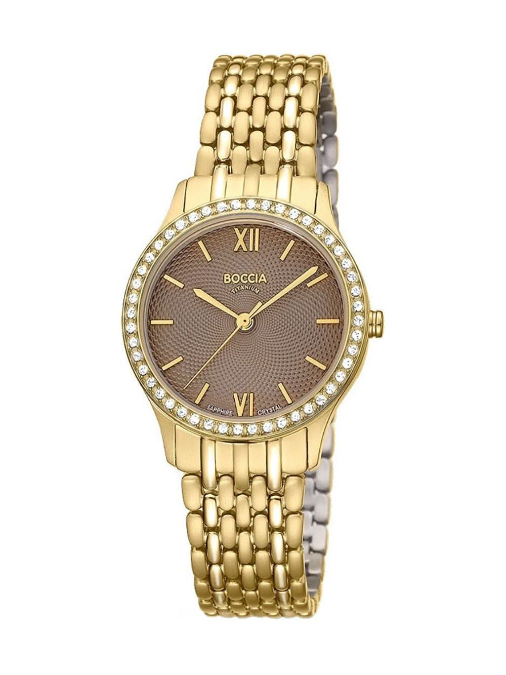Montre pour femme avec bracelet en titane doré, affichage analogique avec chiffres romains, lunette ornée de pierres