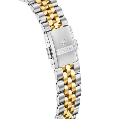 Edelstahlarmband einer Bicolor-Damenuhr mit goldfarbenen Gliedern am Gehäuserand