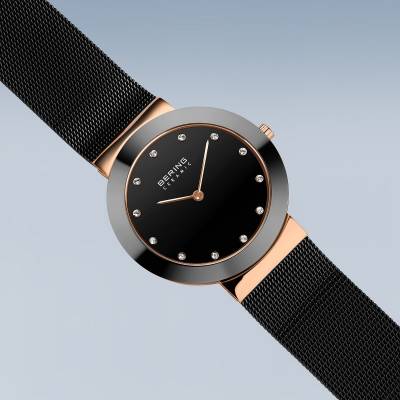 Damenuhr mit schwarzem Zifferblatt, roségoldenen Markierungen und schwarzem Milanaiseband