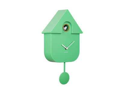 Horloge murale verte en forme de maison avec fenêtre ronde et pendule
