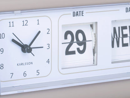 Réveil à volets Détail : chiffres rabattables pour la date et le jour de la semaine, fond blanc