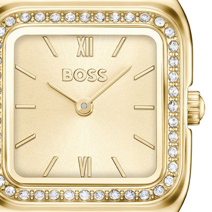 Nahansicht der BOSS Uhr: goldenes rechteckiges Zifferblatt mit römischen Ziffern und Steinreihe.