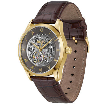 Herrenarmbanduhr mit skelettiertem Zifferblatt, goldfarbener Lünette, braunem Lederarmband