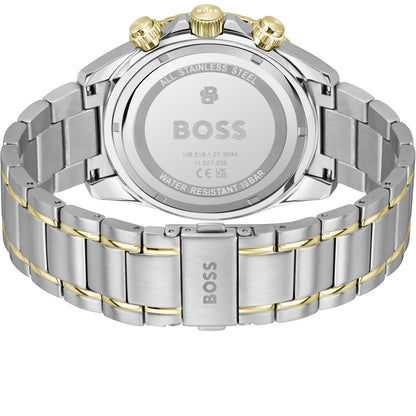 Rückansicht der Armbanduhr: Edelstahlarmband mit goldenen Akzenten und verschraubtem Gehäuseboden.
