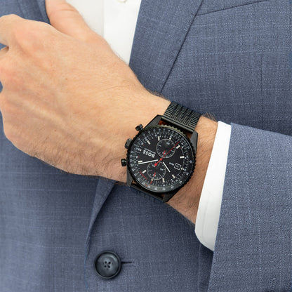 Herren-Chronograph mit Tachymeter, schwarzes Zifferblatt und Mesharmband am Handgelenk