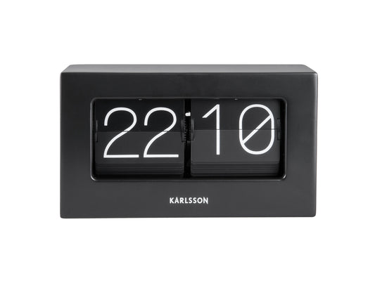 Horloge de table Karlsson dans un boîtier noir avec chiffres à rabat, affichage 22:10