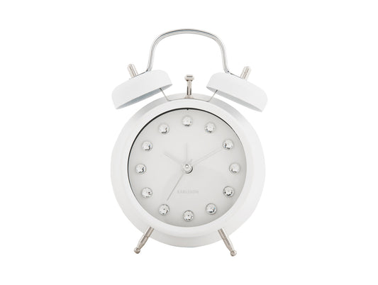 Réveil blanc avec deux cloches et cadran orné de strass.