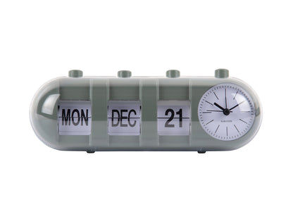 Réveil rétro avec chiffres rabattables LUN/DEC et horloge dans un boîtier tubulaire gris-vert