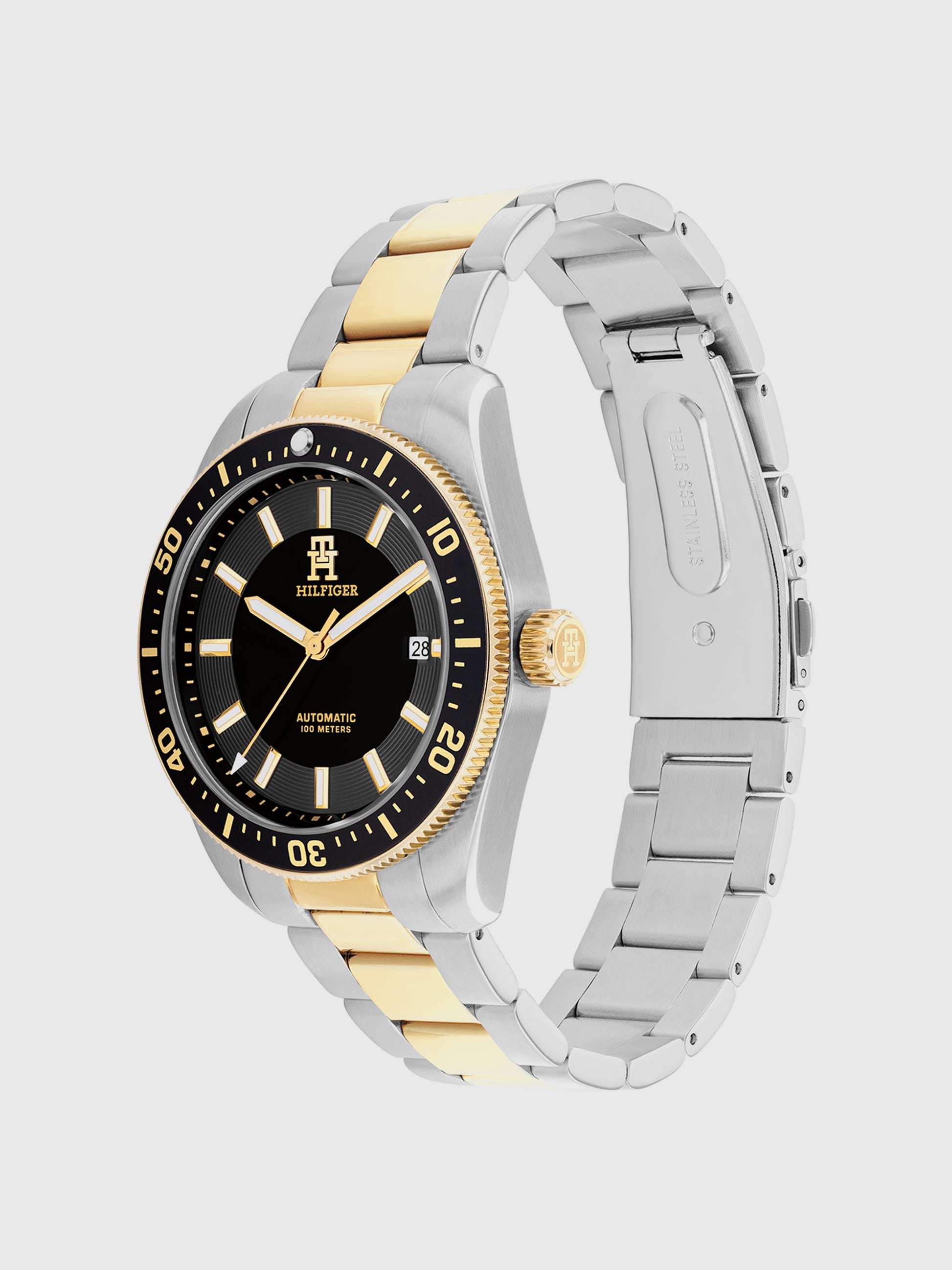 Tommy Hilfiger Herrenarmbanduhr, Seitenansicht: schwarzes Zifferblatt, zweifarbiges Metallband