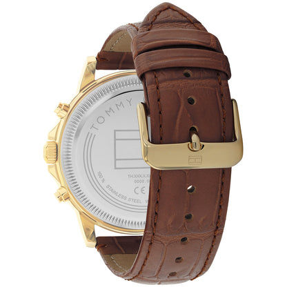 Tommy Hilfiger Quarzuhr mit braunem Lederarmband und goldfarbenem Gehäuse, seitlich