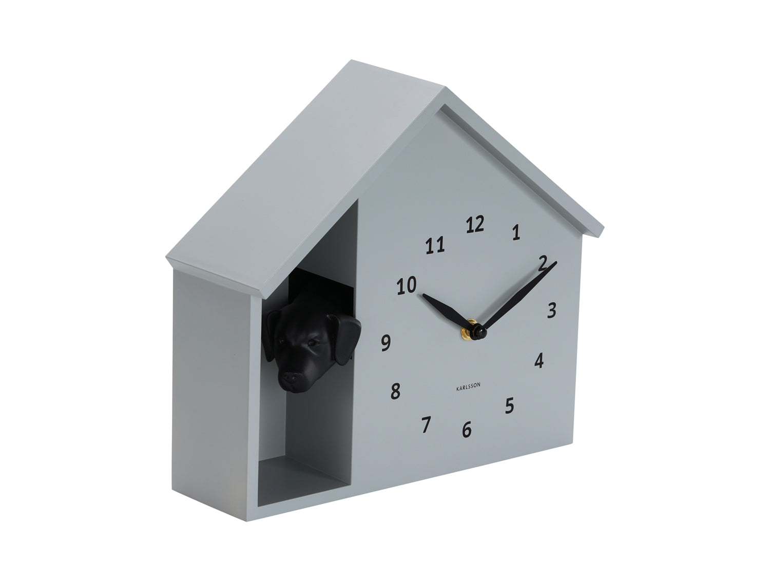 Horloge murale design maison, façade grise avec tête de chien à gauche et aiguilles noires