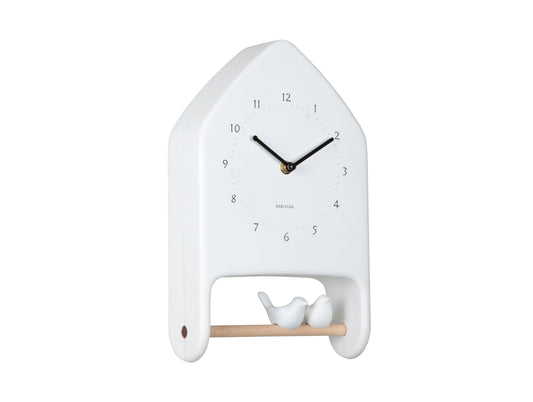 Horloge murale blanche avec chiffres de mouvement et deux oiseaux dans le compartiment inférieur