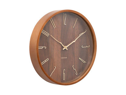 Horloge murale ronde avec cadran en bois foncé, aiguilles et cadre dorés